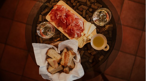 Wine, olive oil, Karst cured ham and cheese