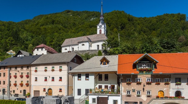 The church standing above foundry houses