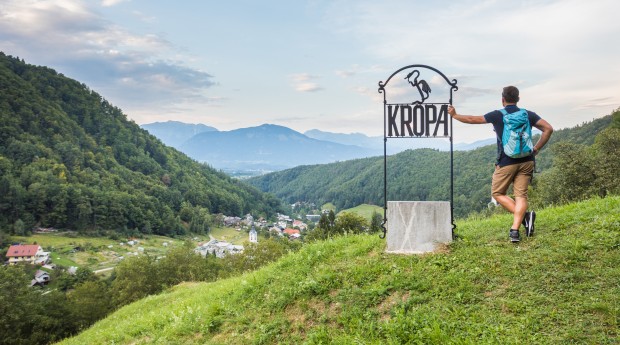 The wrought iron sign on entering Kropa